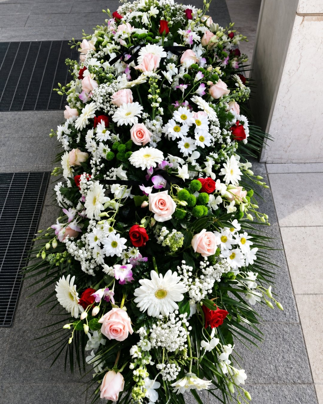 Composizione floreale funebre